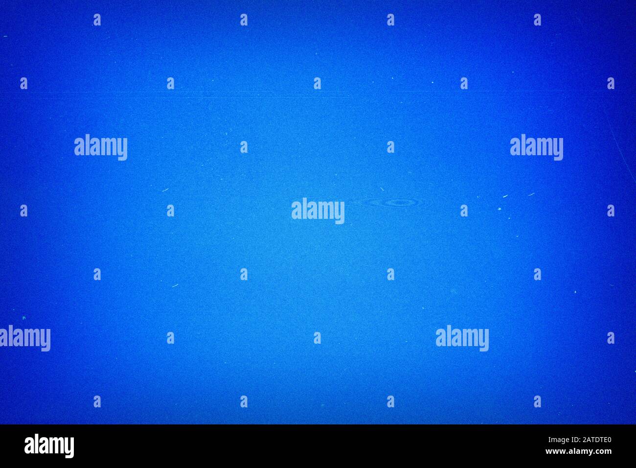 Blank grungy filmstrip texture background with heavy grain, dust and newton rings Stock Photo