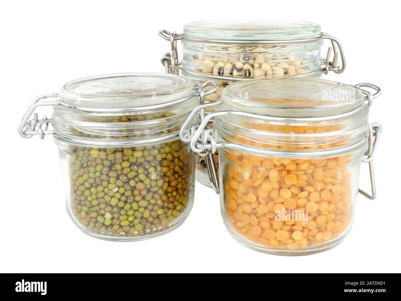 Glass food storage jars filled with green lentils isolated on a white background Stock Photo Alamy