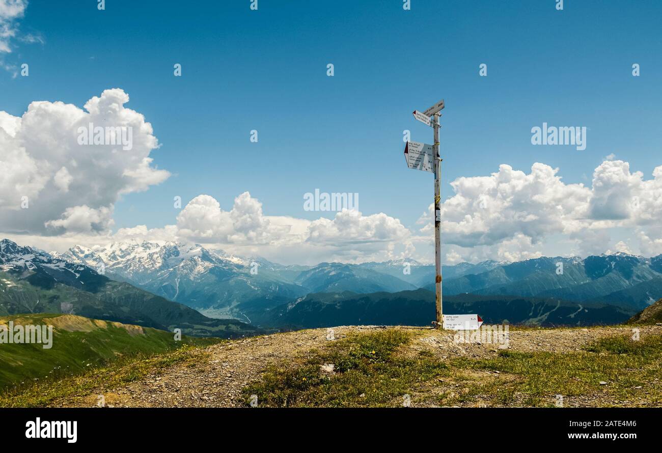 A signpost on Guli Pass showing the nearest locations. Caucasus Mountains, Svaneti, Georgia. Stock Photo