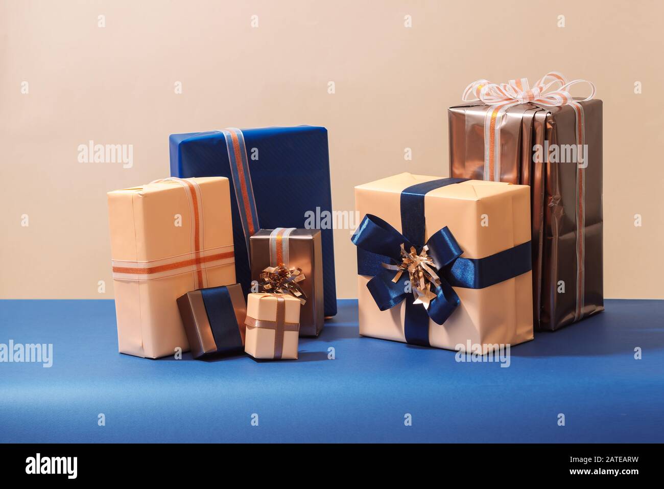 Christmas wrapped gift boxes on blue background Stock Photo - Alamy