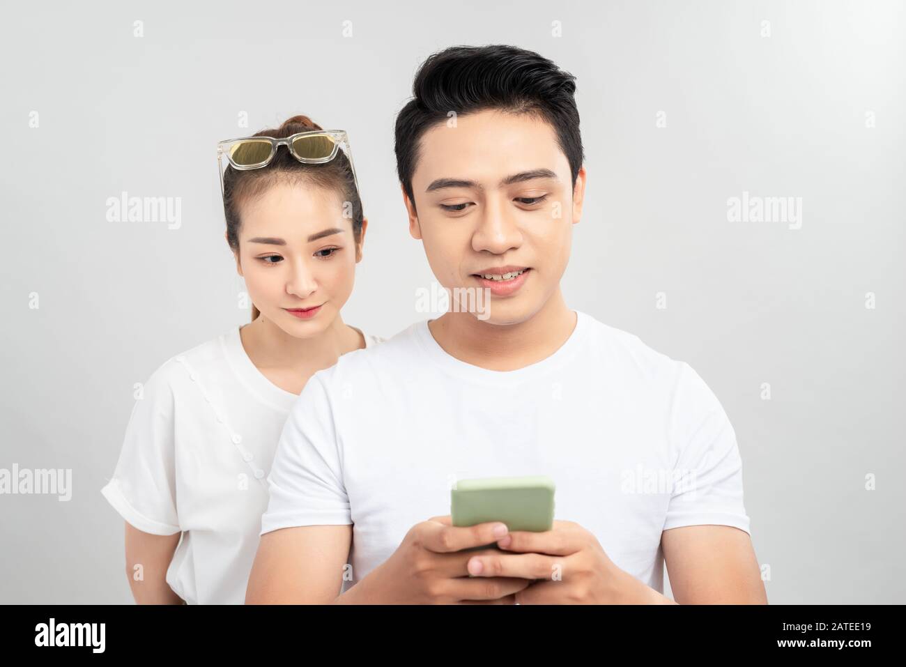 Young people with mobile phones family to spy Stock Photo - Alamy