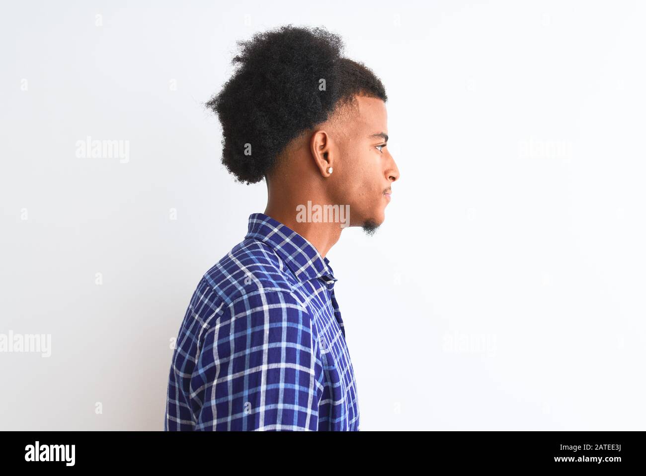Young african american man wearing casual shirt standing over isolated ...