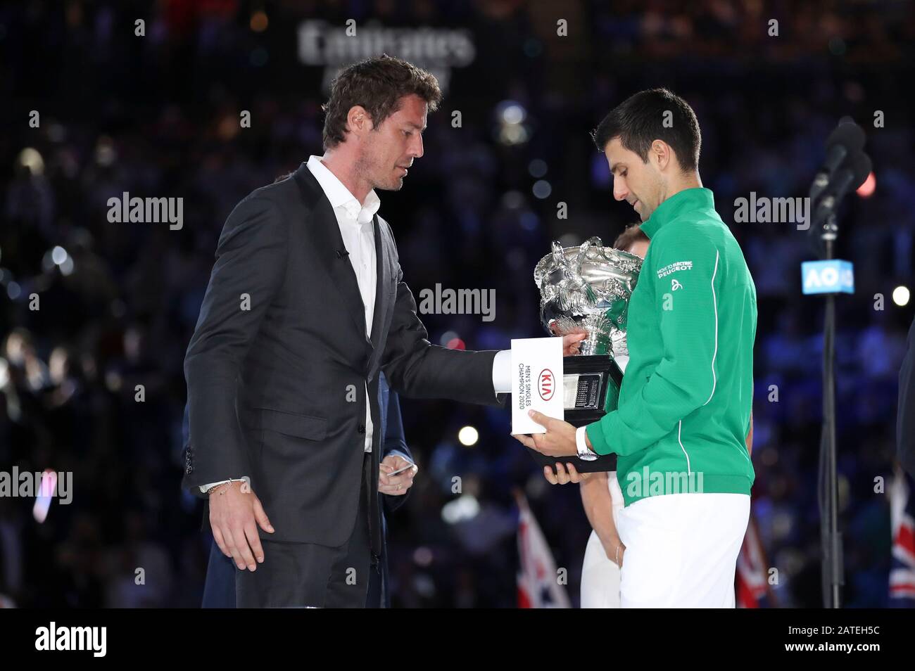 melbourne-australia-2nd-feb-2020-russias-marat-safin-l-hands-the-trophy-to-novak-djokovic-of-serbia-during-the-awarding-ceremony-after-the-mens-singles-final-against-dominic-thiem-of-austria-at-2020-australian-open-in-melbourne-australia-on-feb-2-2020-credit-bai-xuefeixinhuaalamy-live-news-2ATEH5C.jpg