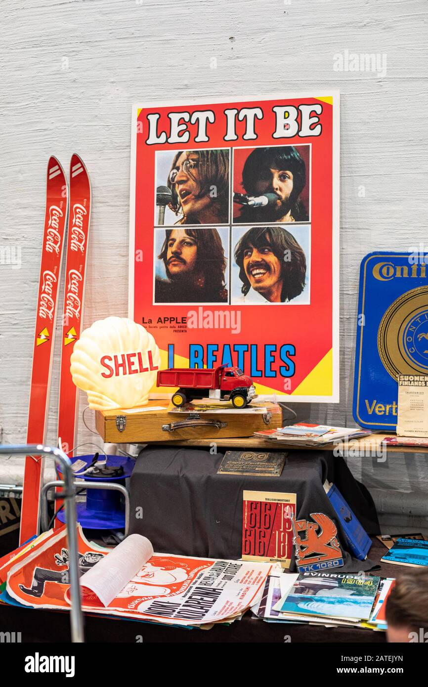 Coca-Cola skis, The Beatles poster and Shell lamp for sale at Retro and Vintage Design Expo in Helsinki, Finland Stock Photo