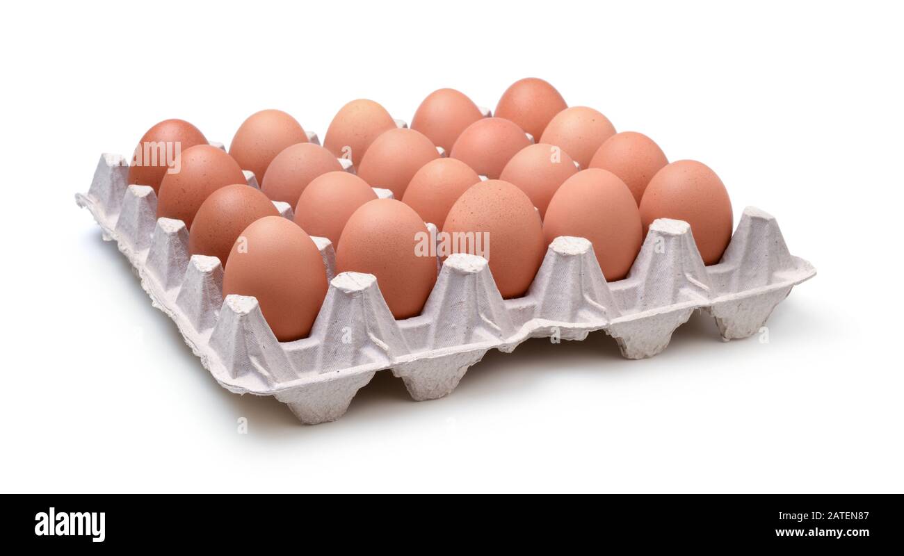Cardboard tray with chicken eggs isolated on white background. Stock Photo