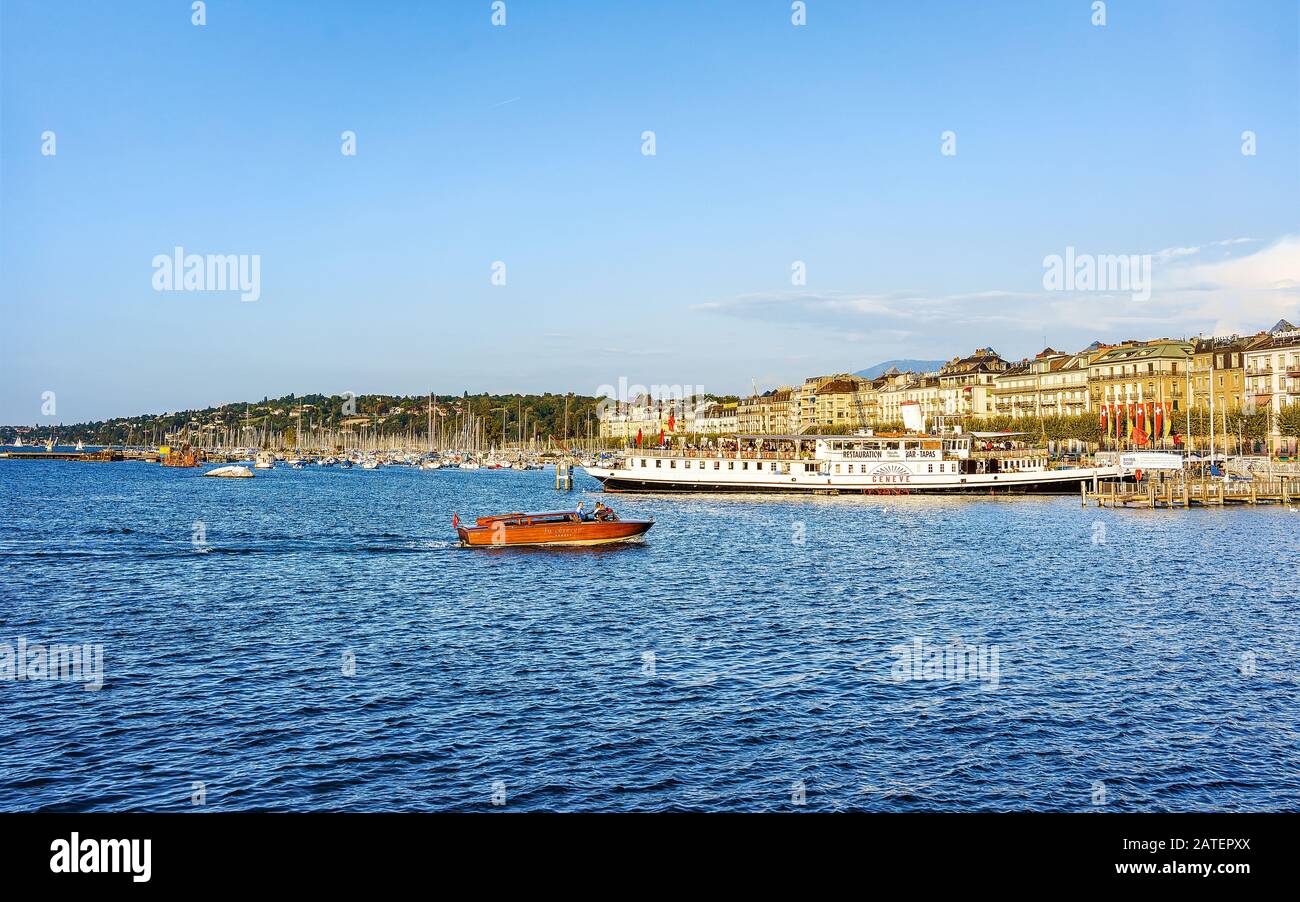 Boats on the Geneva Lake at Promenade du Lac in summer Stock Photo - Alamy