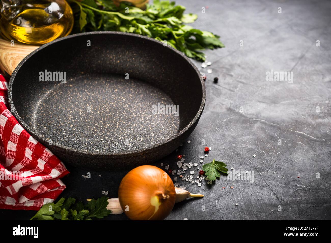 Food cooking background on black table Stock Photo - Alamy