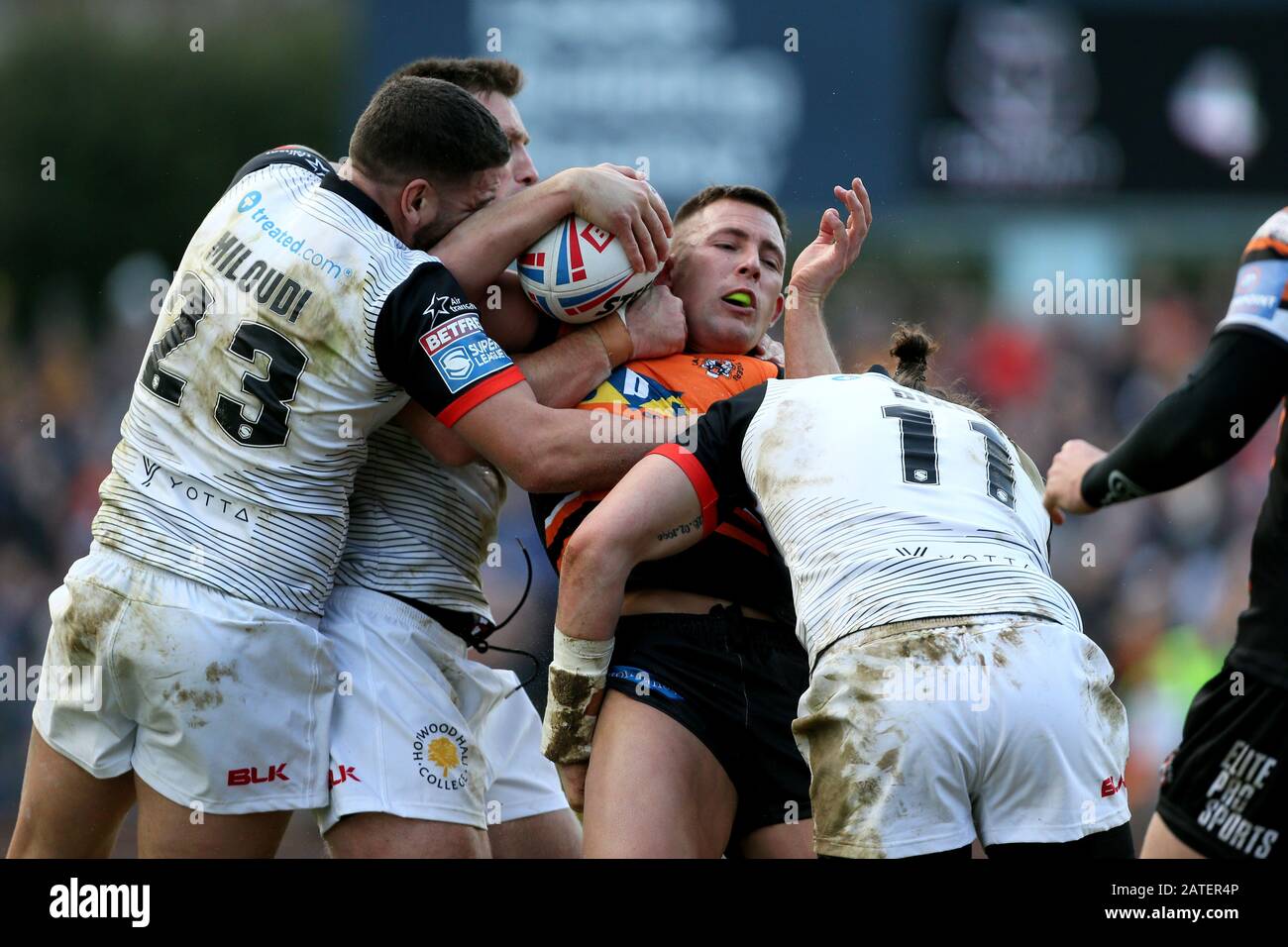 Castleford Tigers Greg Eden gets tackled during the Betfred Super League match at Emerald Headingley Stadium, Leeds. Stock Photo