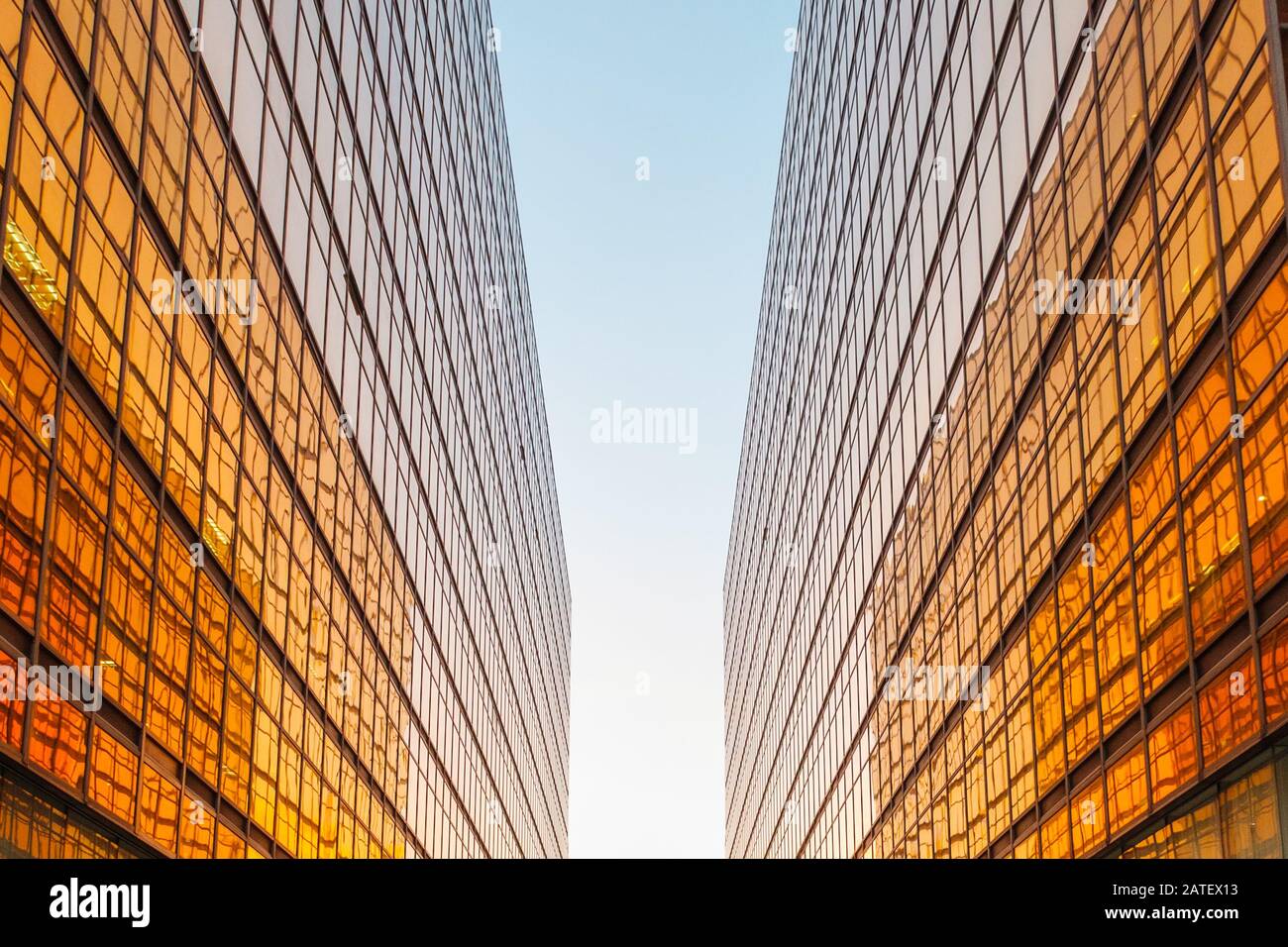 golden office building facade and blue sky Stock Photo - Alamy