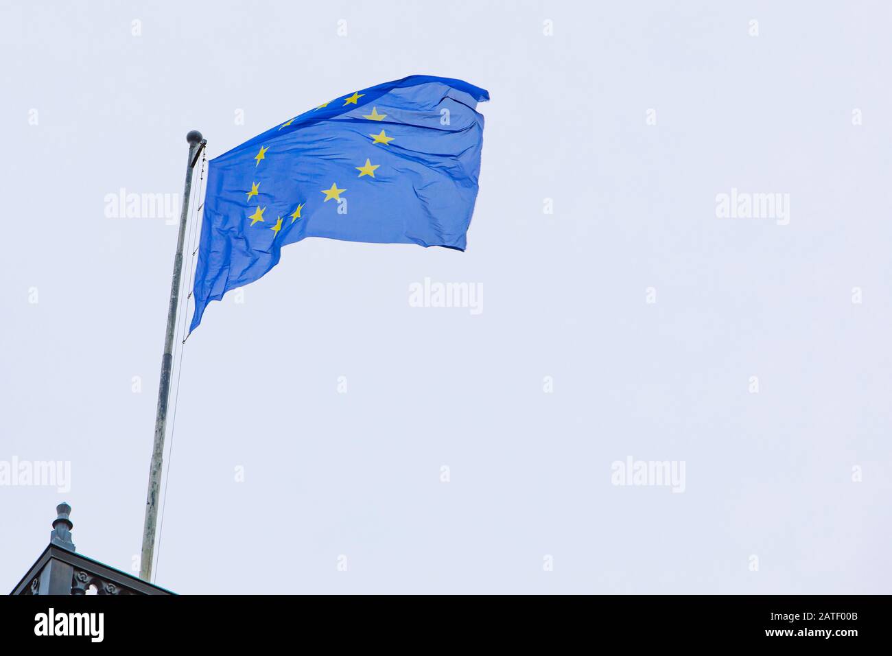 european union flag in front of blue sky Stock Photo - Alamy
