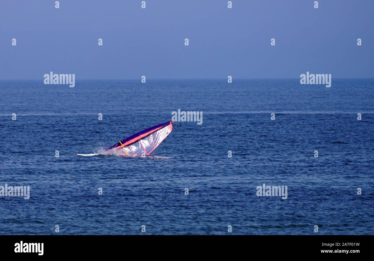 Wind surfer crashing in Gaspesie  Quebec sail going in water Stock Photo