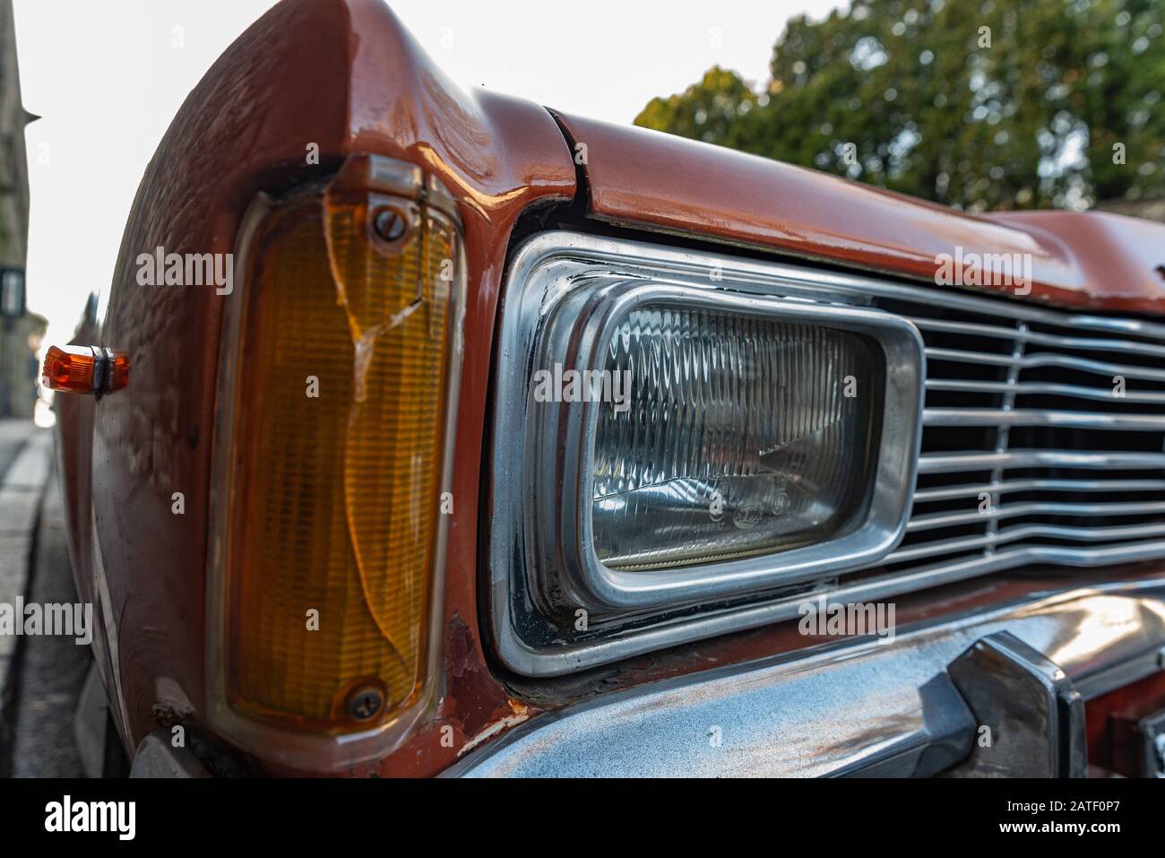 Details of an historic American car, front car light and direction indicator Stock Photo