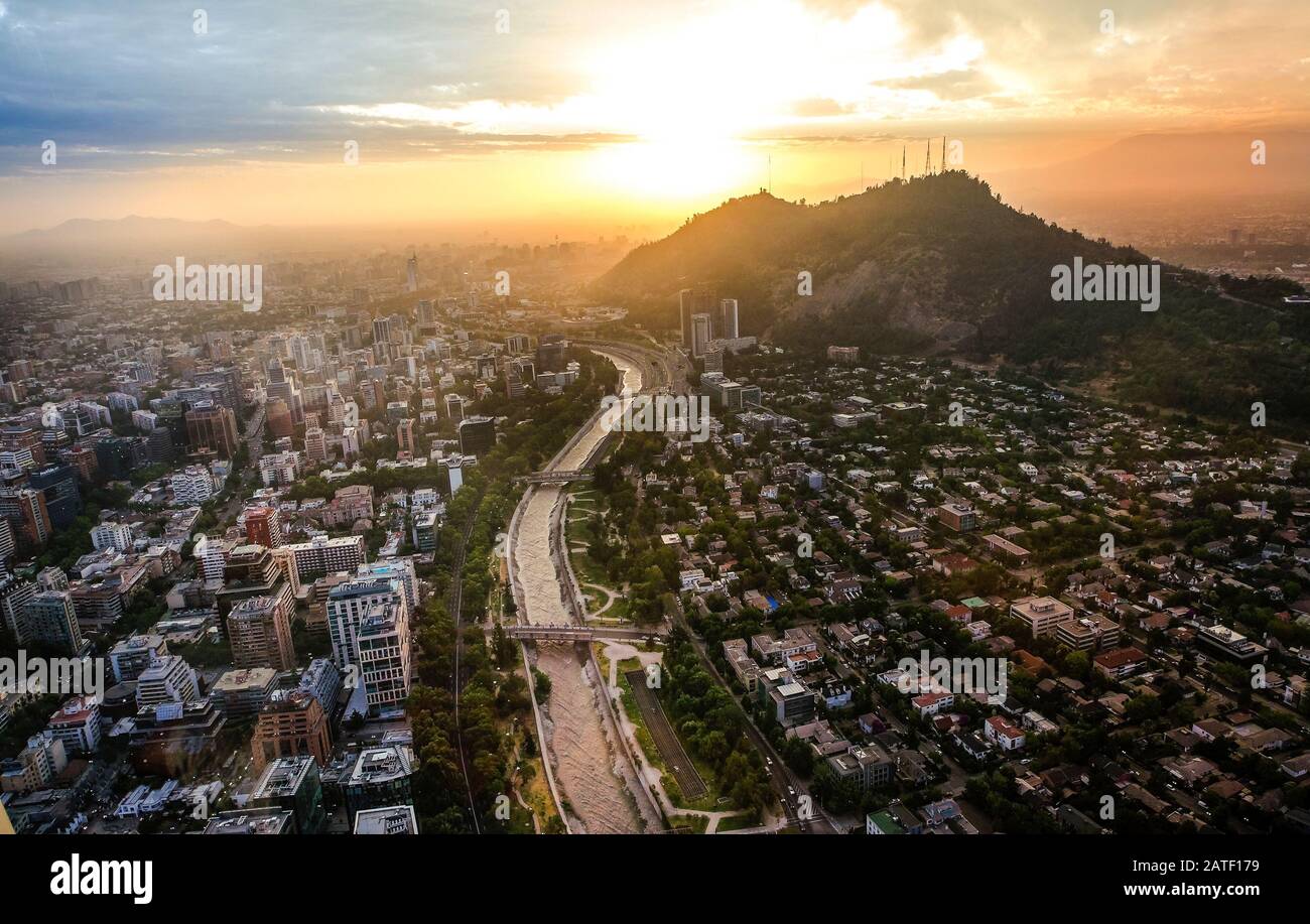 Santiago de Chile cityscape at sunset with Mapocho river and ...