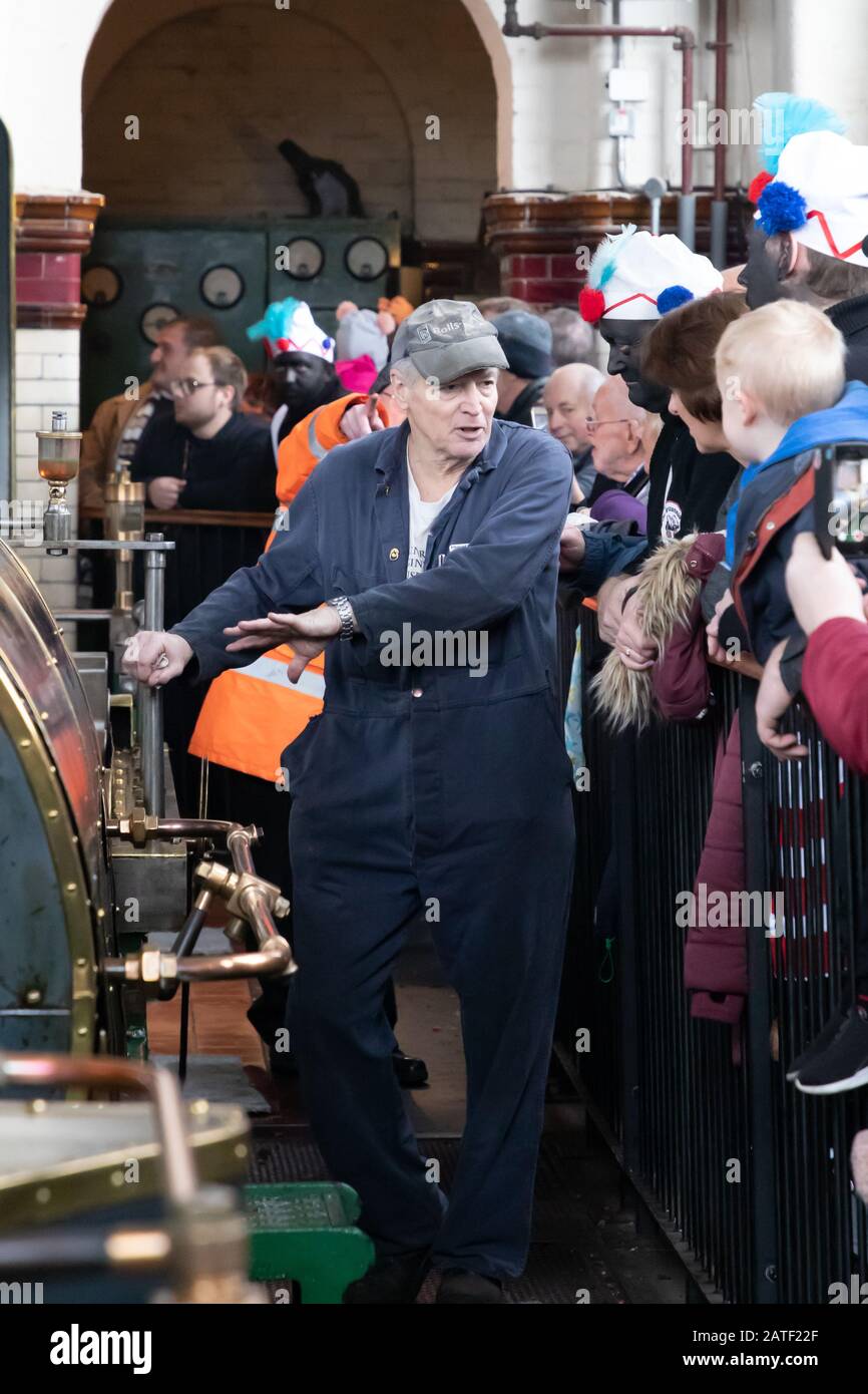 a-volunteer-explains-the-working-of-a-steam-engine-at-ellenroad-museum