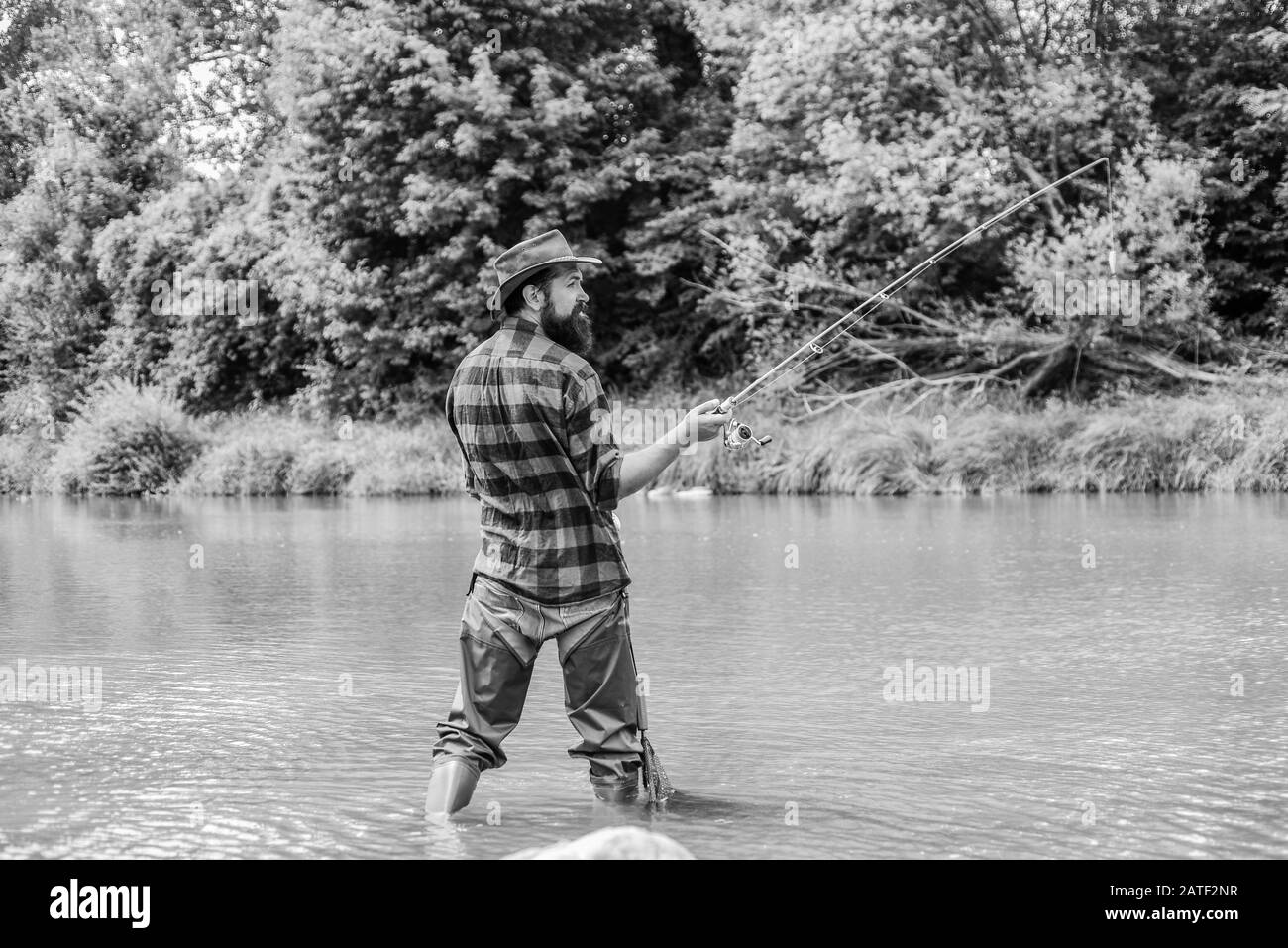 Fisherman catching fish. Fishing hobby. Calm and tranquil