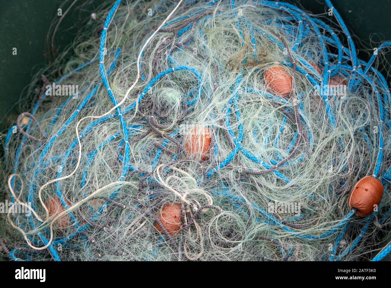 Commercial fishing nets cork floats hi-res stock photography and