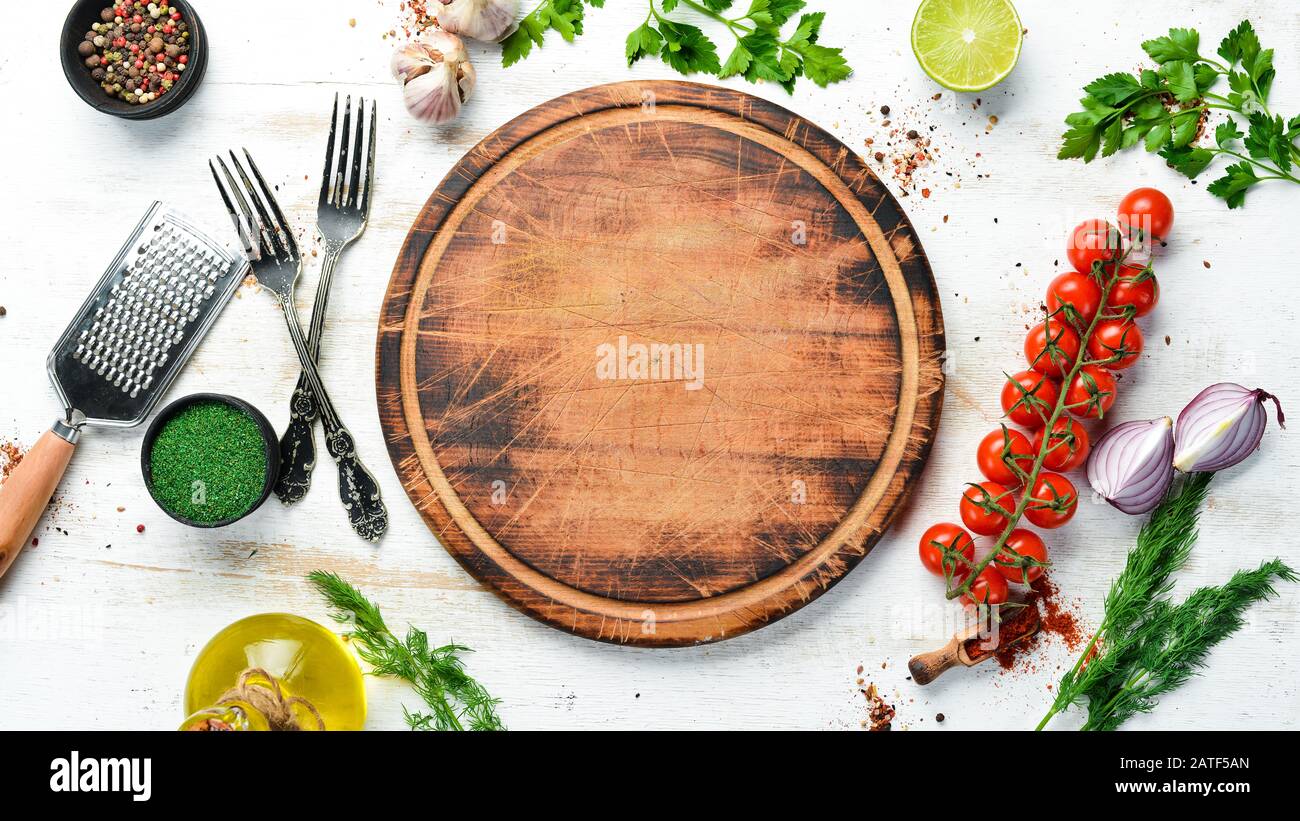 Food banner. Spices, vegetables and herbs on a white wooden background. Top  view. free space for your text. Rustic style Stock Photo - Alamy