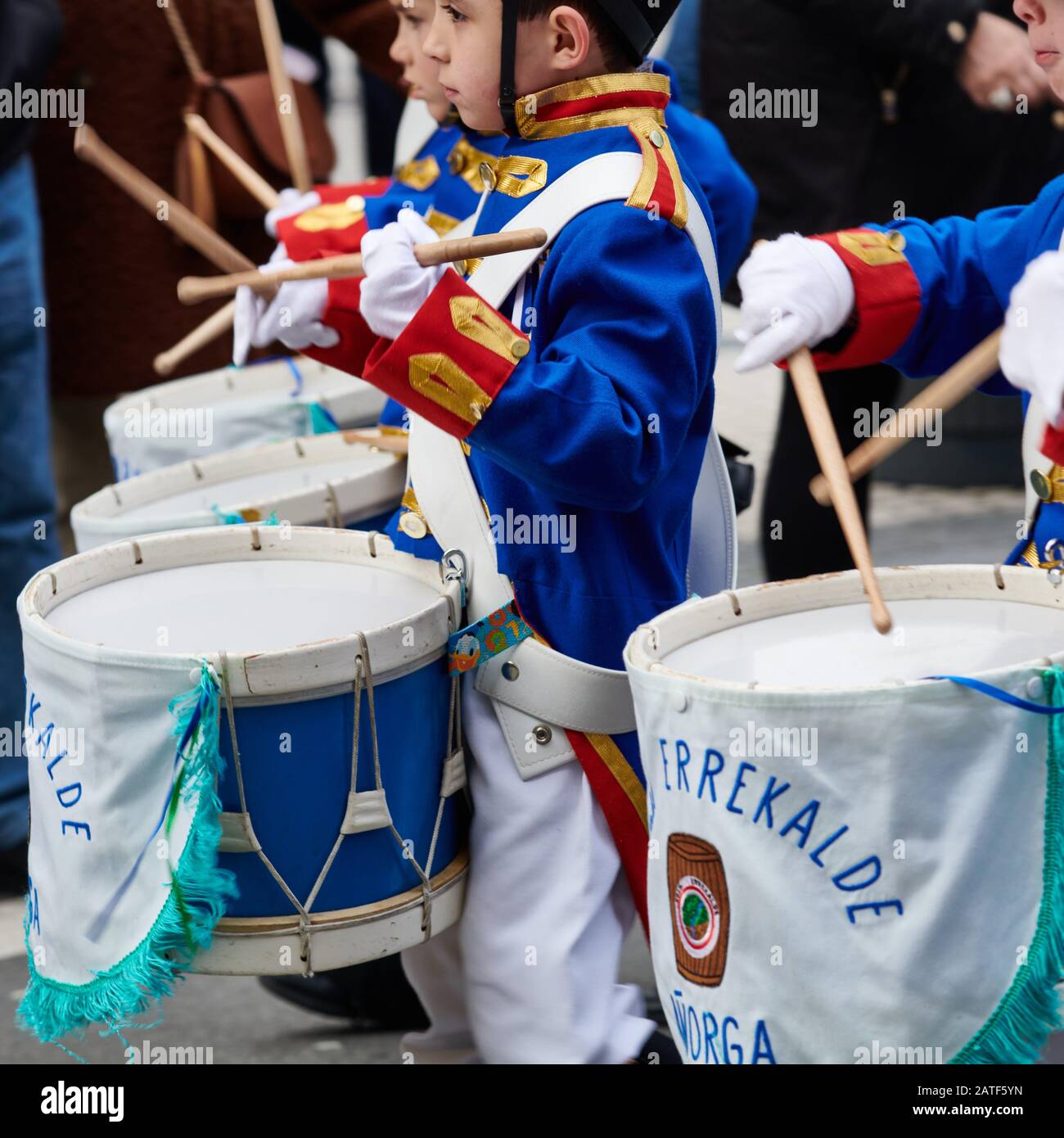 Traditional Tamborrada parade of children dressed up as soldiers and  cooks in Donostia-San Sebastian, Spain Stock Photo