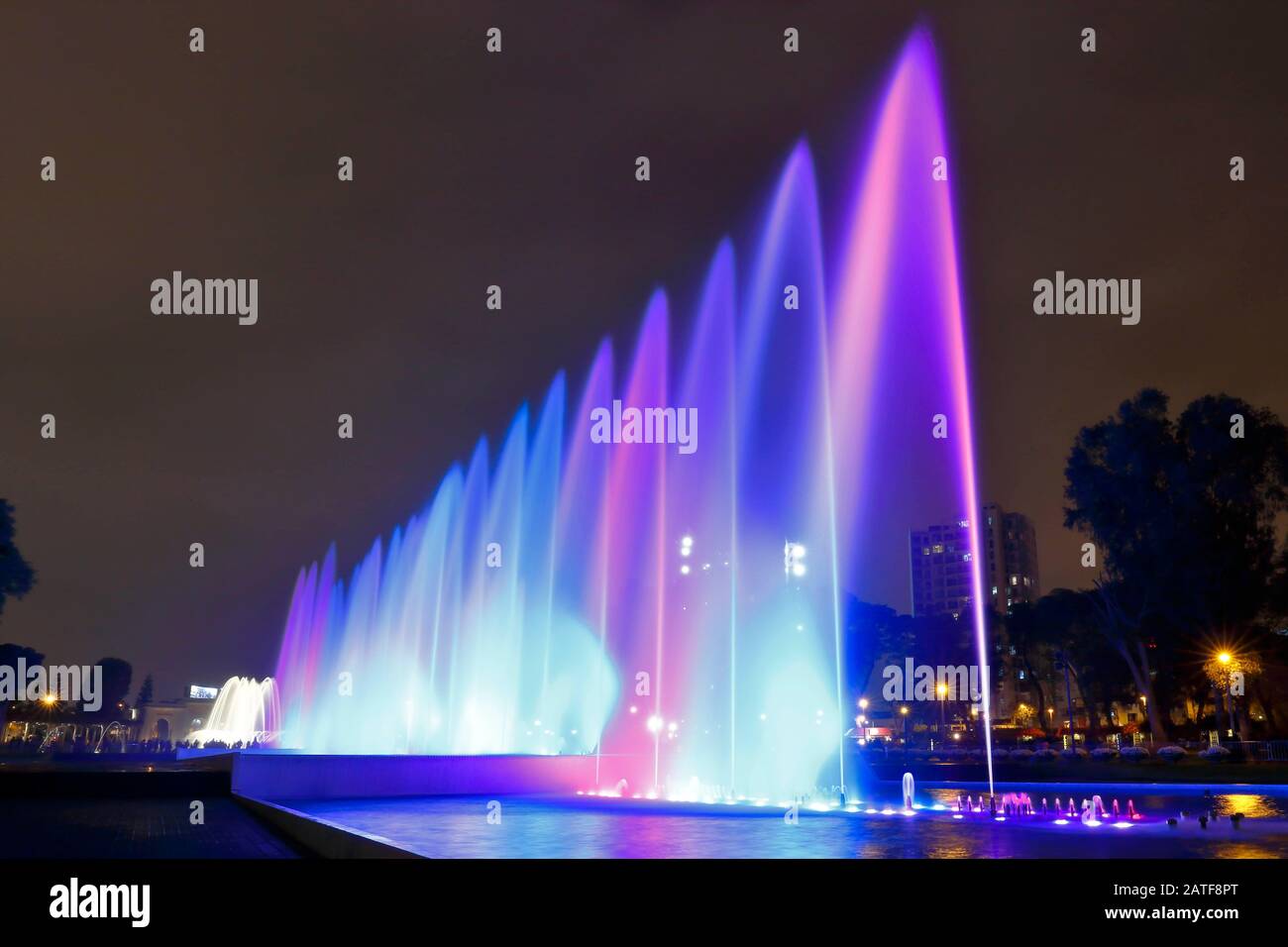 Beautiful view of a colorful water fountain, inside the magical water circuit in Lima, one of the largest existing water theme parks. Lima Peru Stock Photo