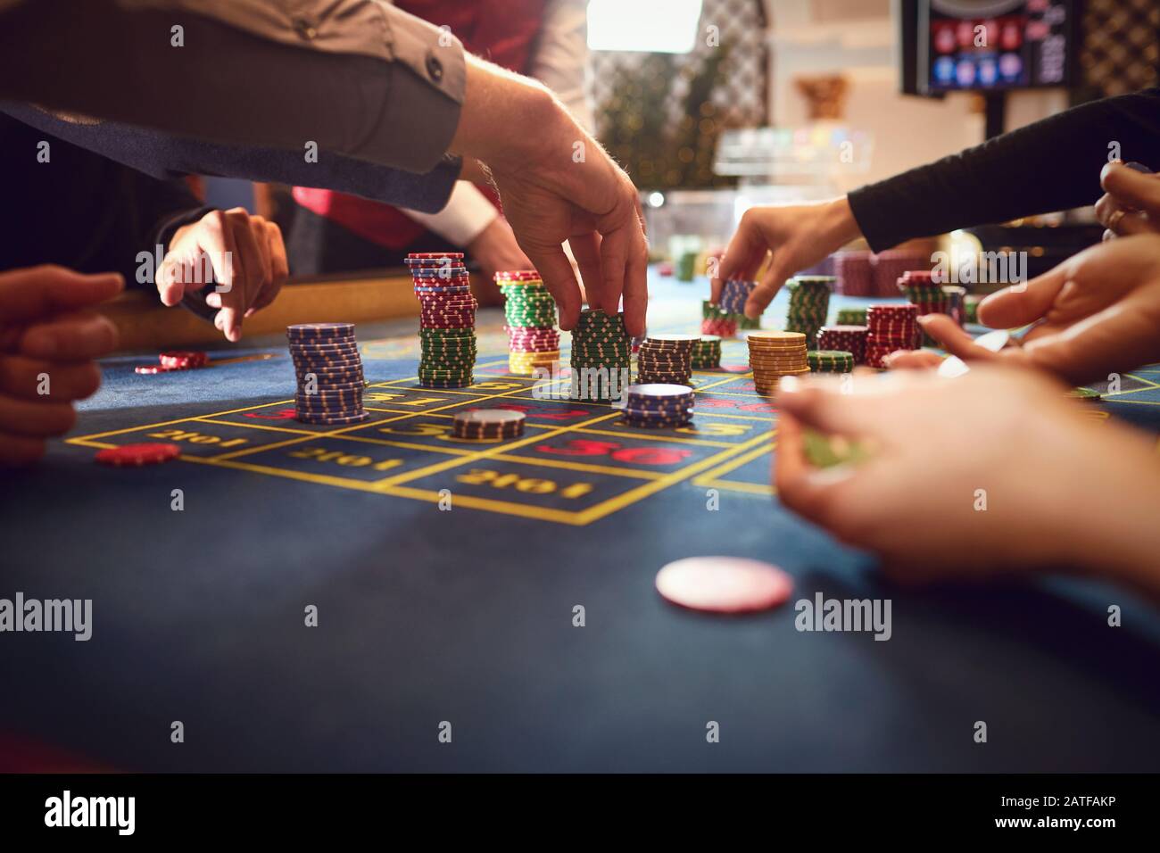 Casino table with roulette and chips Stock Photo - Alamy