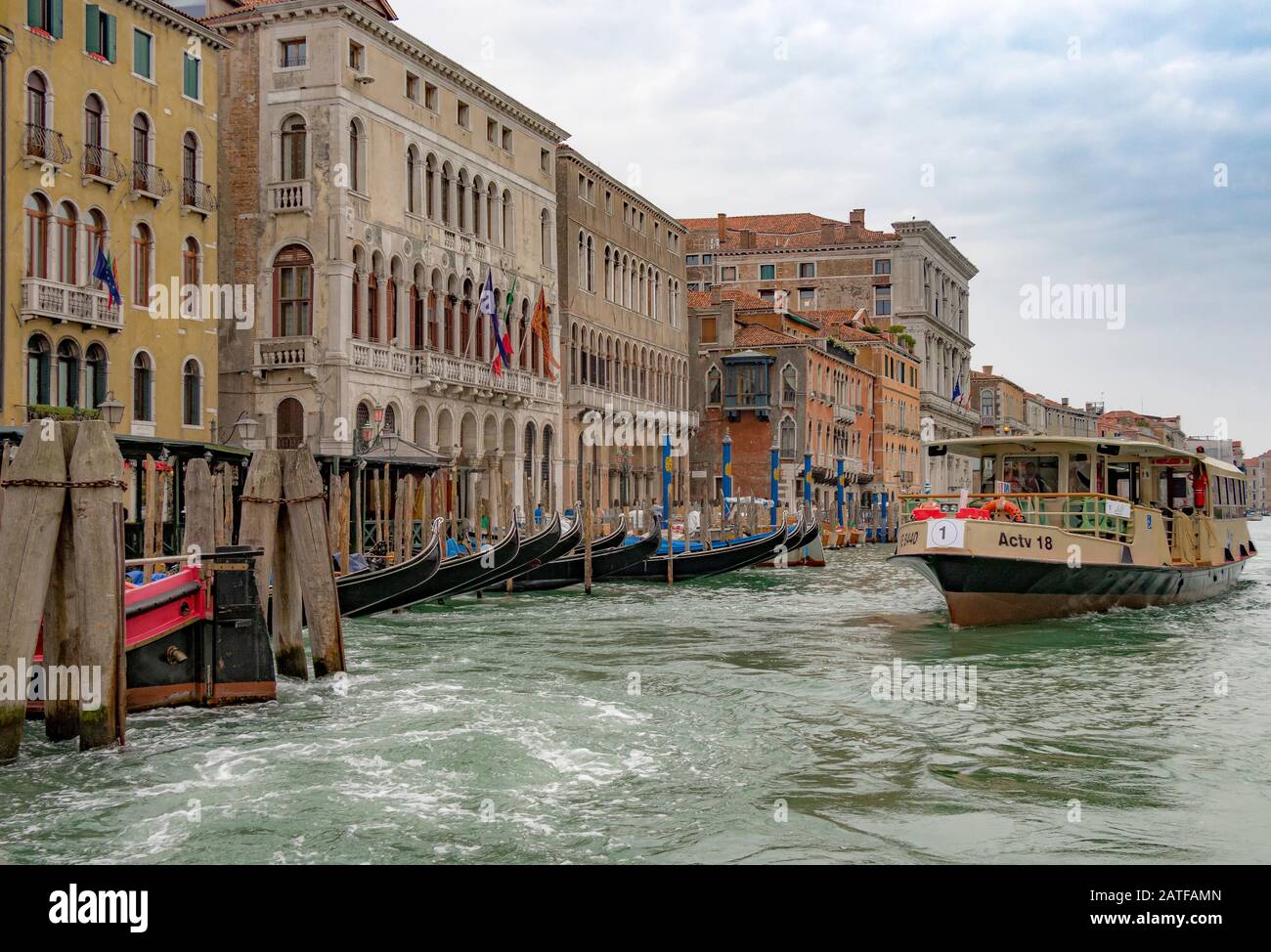 A route 1 Vaporetto makes it's way along The Grand Canal Of Venice ...