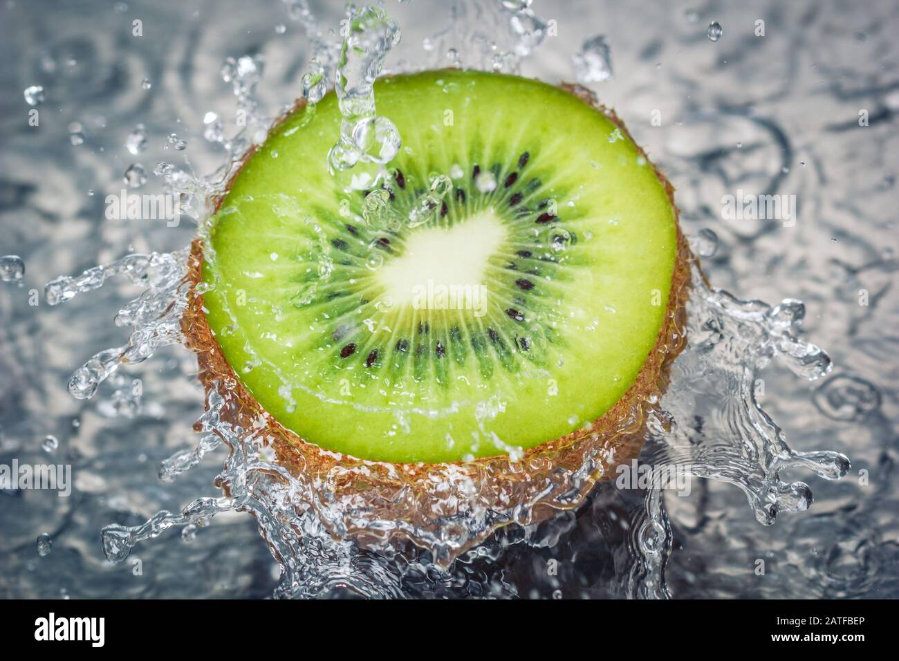 Kiwi fruit water splash Concept of fresh tasty healthy fruit. Water