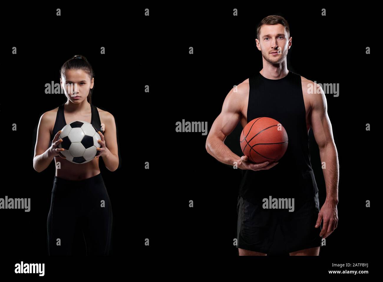 Pretty young soccer player and muscular male basketballer holding balls Stock Photo