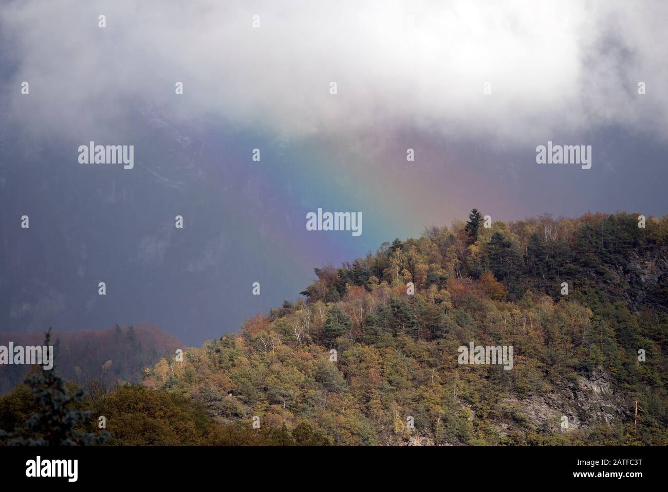 Rainbow in the Alps Stock Photo