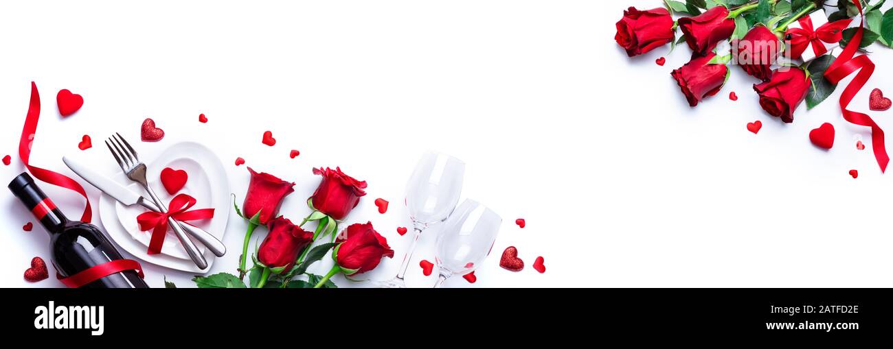 Valentines Day Dinner White Romantic Table Setting With Wine And Red