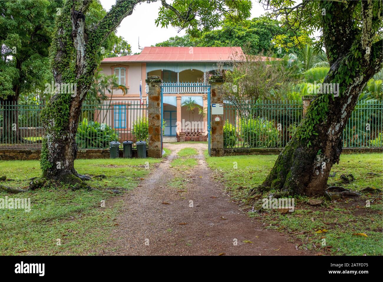 Administrative building of abandoned penal colony or jail on Salvation's Islands, taken on an overcast day with no people, French Guiana Stock Photo