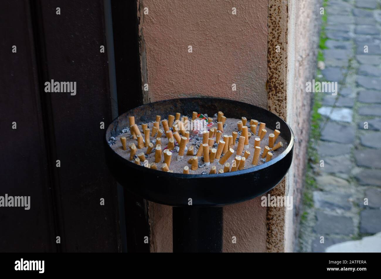 Outdoor ashtray with cigarettes Stock Photo Alamy
