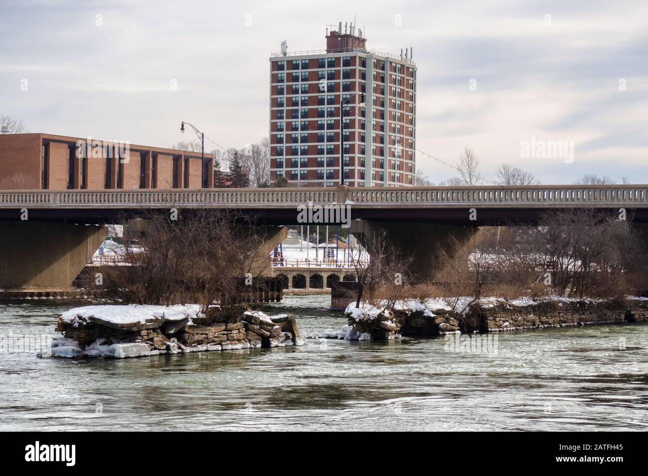 Oswego, New York, USA. January 23, 2020. View of the Oswego River in downtown Oswego, New York on an overcast winter afternoon Stock Photo