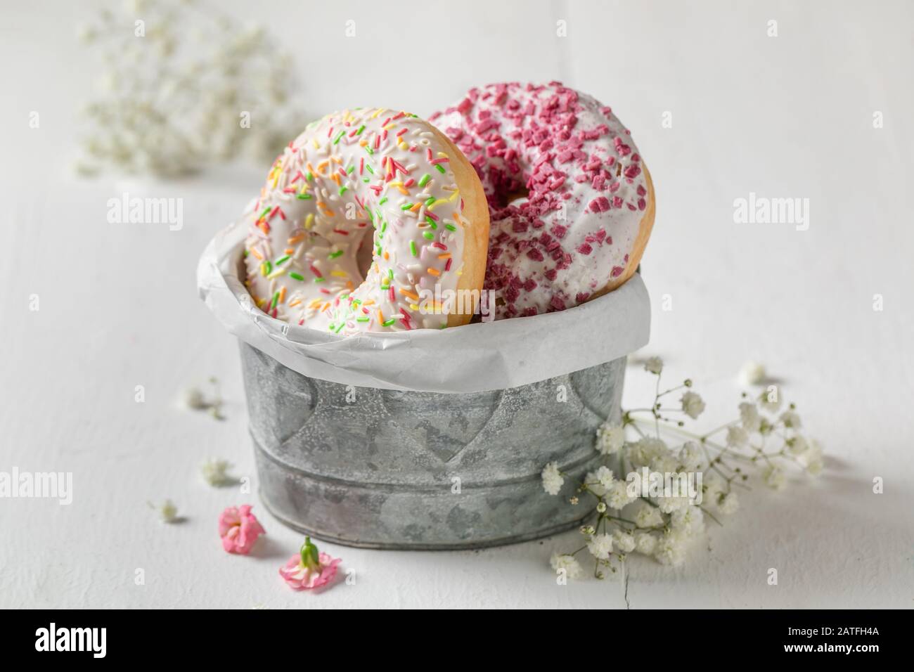 Yummy donuts with various types of toppings Stock Photo