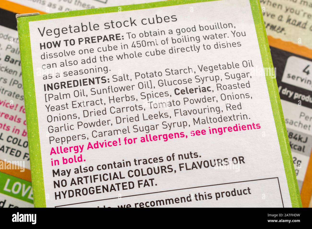 ASDA vegetable stock cubes food packaging displaying dietary nutrition information box, food fat content, salt content, red food allergen warning Stock Photo
