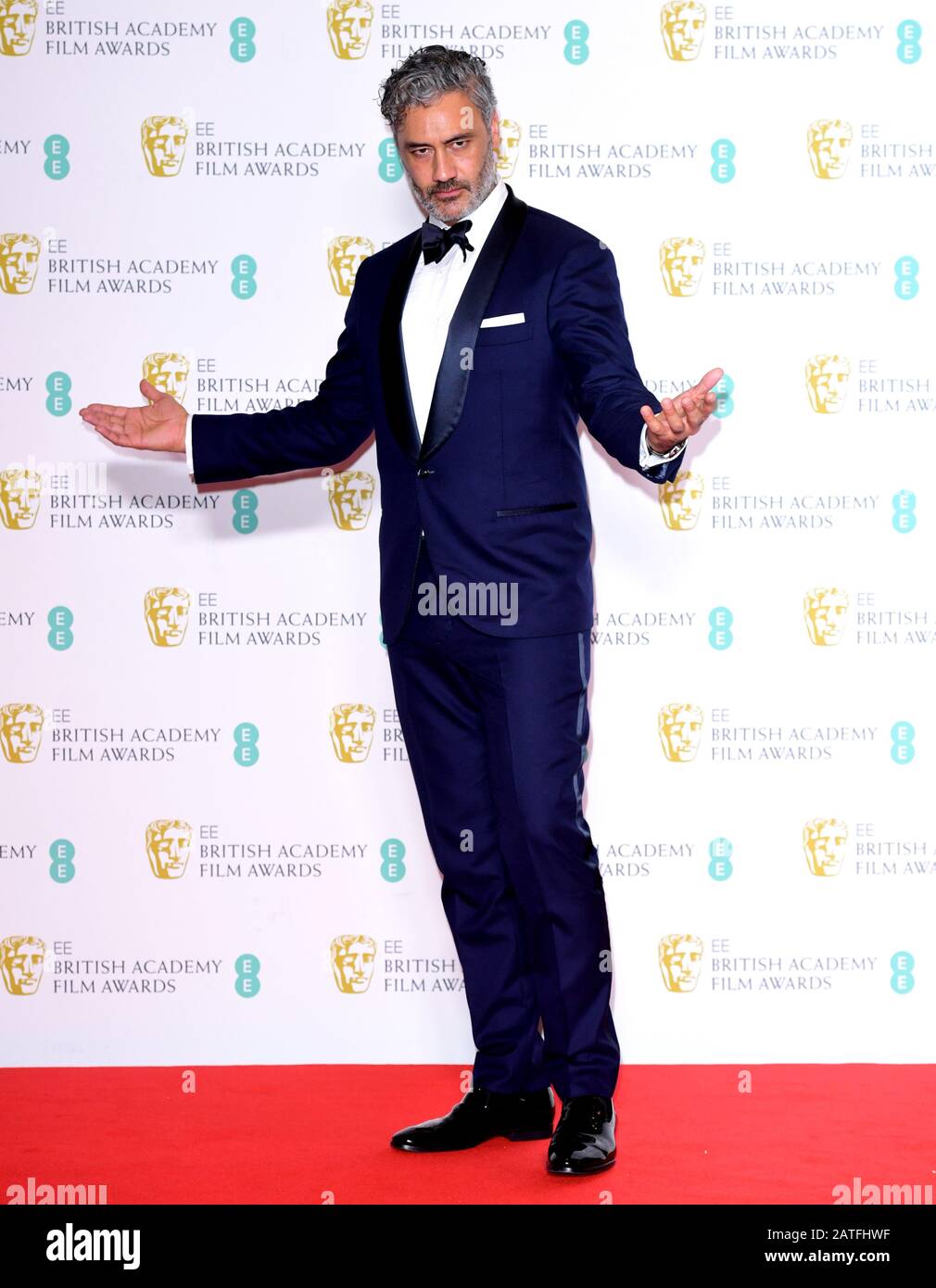 Taika Waititi in the press room at the 73rd British Academy Film Awards held at the Royal Albert Hall, London. Stock Photo
