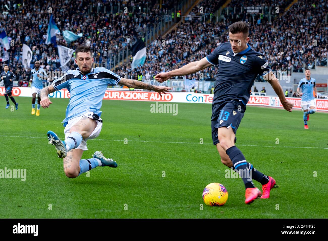 Francesco Acerbi Of Lazio And Arkadiusz Reca Of Spal In Action During The Serie A Match Between Ss Lazio And Spal At Stadio Olimpico Final Score Ss Lazio 5 1 Spal Stock Photo