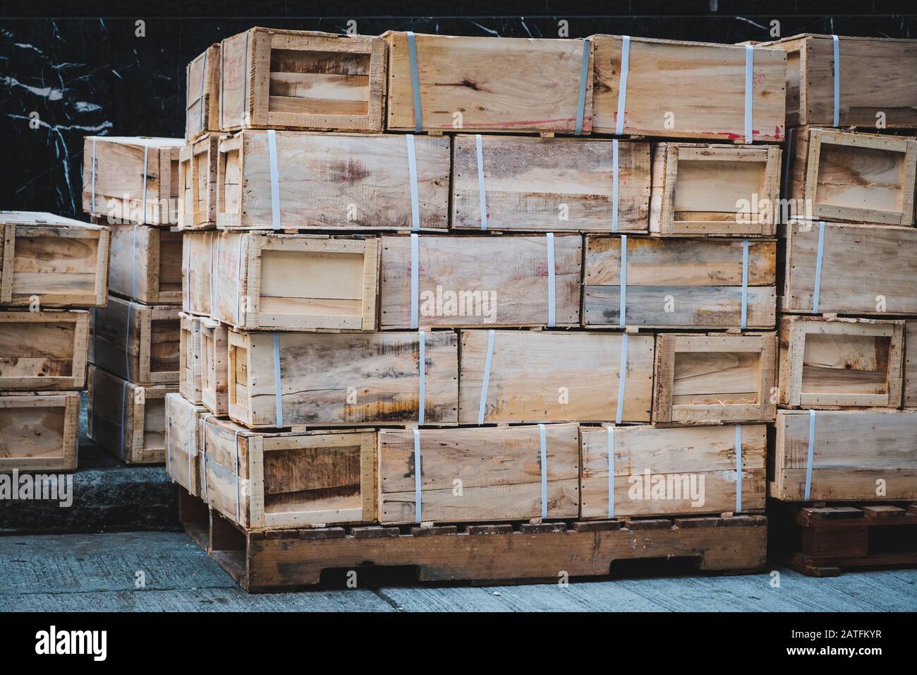 Chinese import, export goods in wooden boxes stacked on pallet Stock
