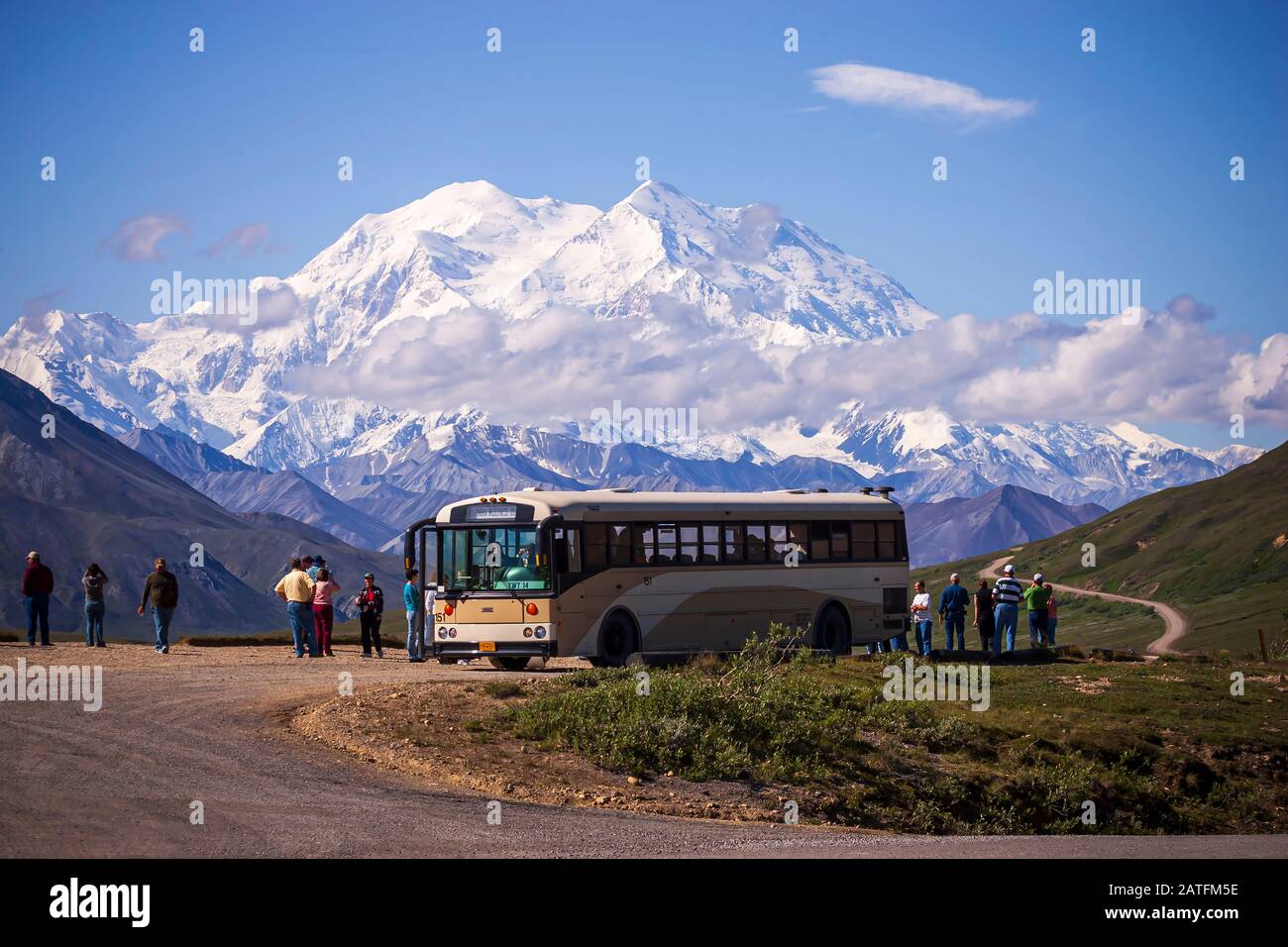 Tourist Tour Bus, tourists looking at Denali from Stoney Overlook Denali National Park, Alaska Stock Photo