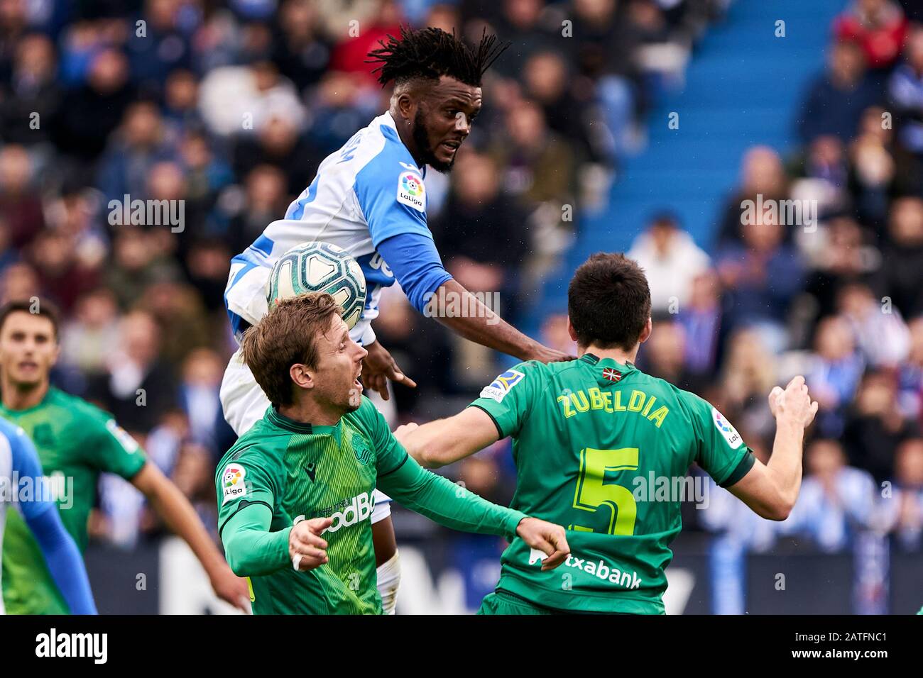 Chidozie Collins Awaziem of CD Leganes and Nacho Monreal of Real Sociedad are seen in action during the La Liga football match between CD Leganes and Real Sociedad at Butarque Stadium in Leganes.(Final score; CD Leganes 2:1Real Sociedad) Stock Photo