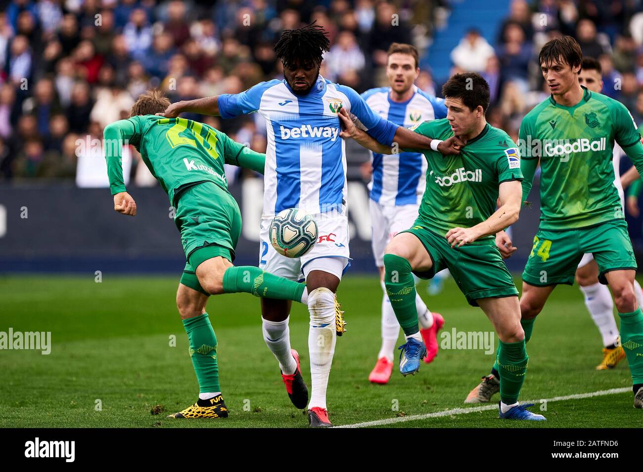 Chidozie Collins Awaziem of CD Leganes and Igor Zubeldia of Real Sociedad are seen in action during the La Liga football match between CD Leganes and Real Sociedad at Butarque Stadium in Leganes.(Final score; CD Leganes 2:1Real Sociedad) Stock Photo