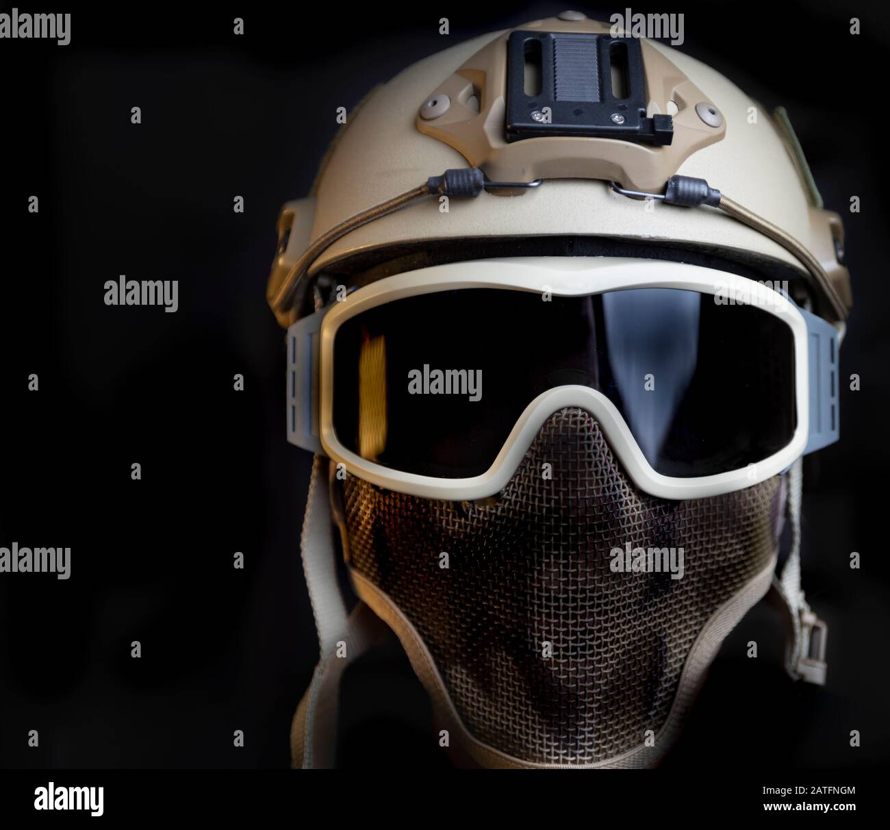 Concept of masked assailant black background Stock Photo