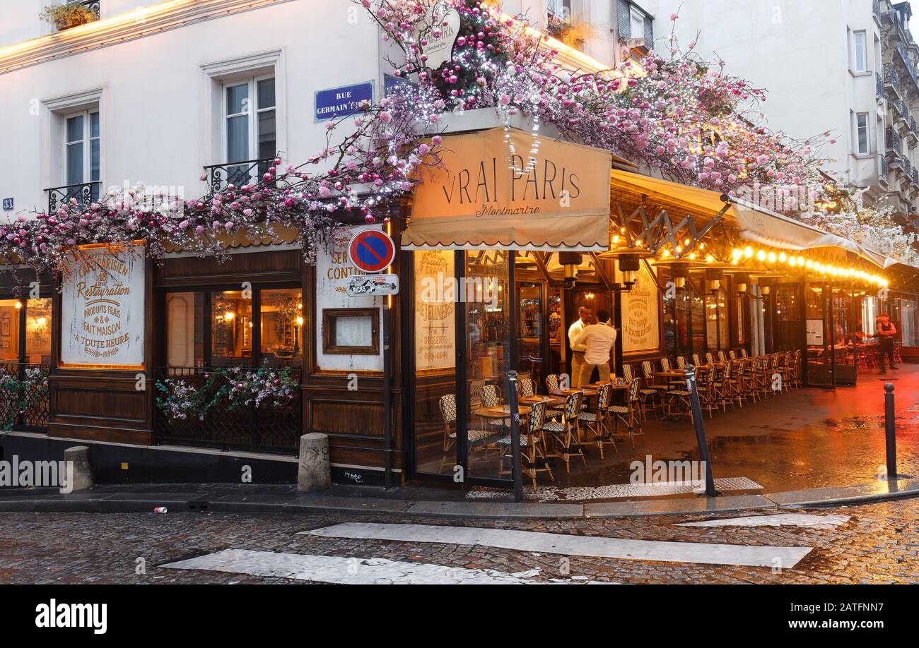 Cafe Le Vrai Paris at rainy morning . It is a traditional French cafe