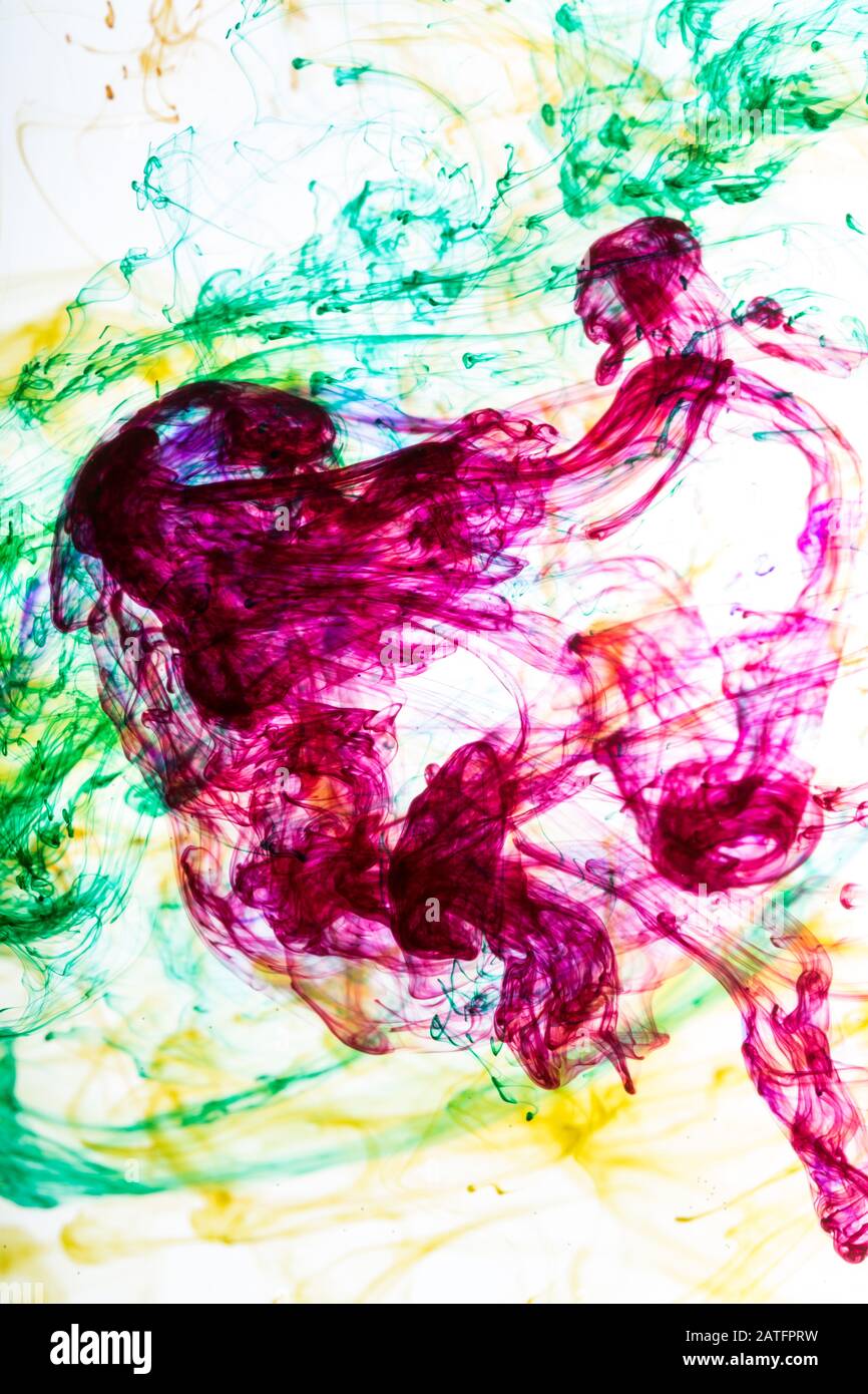 Acrylic colors and ink in water. Abstract background Stock Photo Alamy