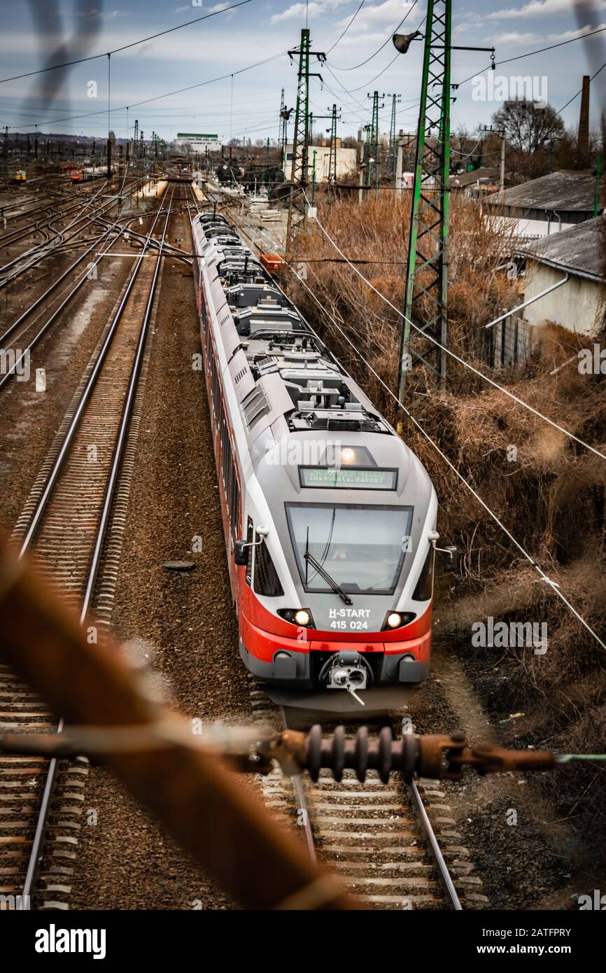 Hungarian State Railways trains leave Rákos station Stock Photo
