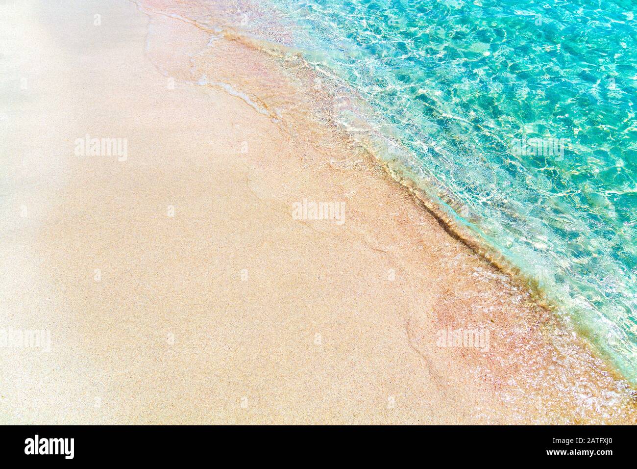 Clear blue azure water with white sandy beach background (S'Espalmador, Balearic Islands, Spain) Stock Photo