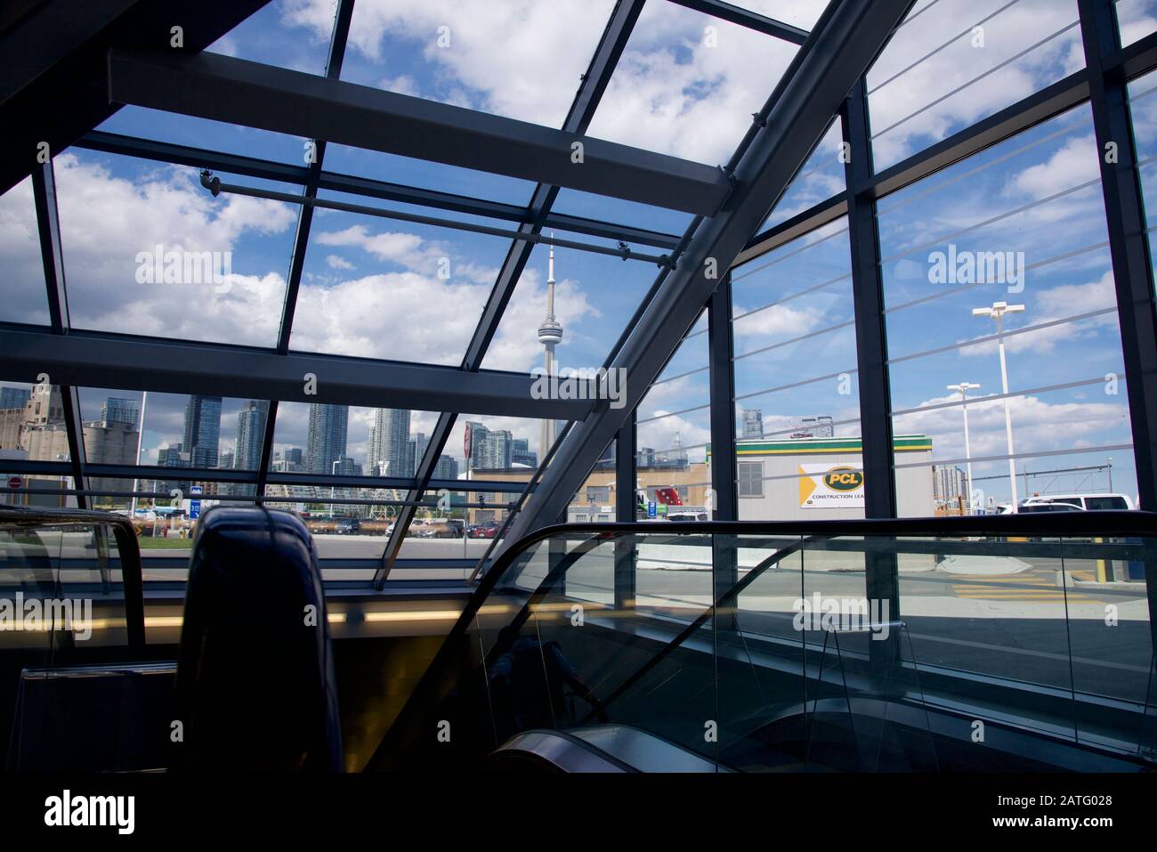 View of Toronto cityscape through the window of the Billy Bishop Toronto City Airport Terminal Stock Photo