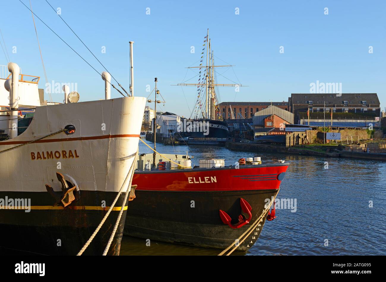 Bows of the Balmoral and the Ellen seen moored opposite the SS Great Britain in the floating harbour in the city docks, Bristol, UK, on a sunny day Stock Photo