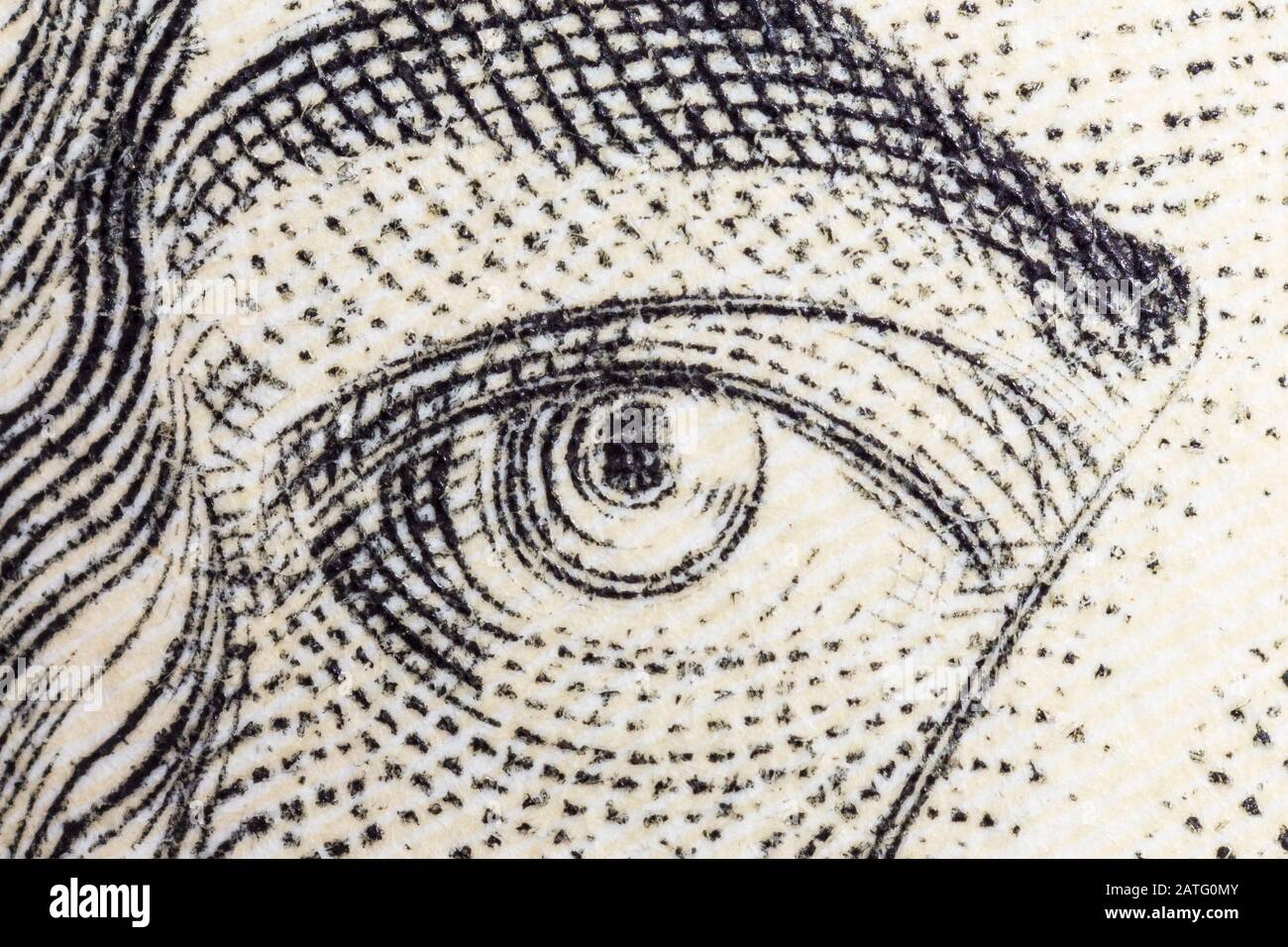Macro close up photograph of Alexander Hamilton eye on the US ten dollar bill. Stock Photo