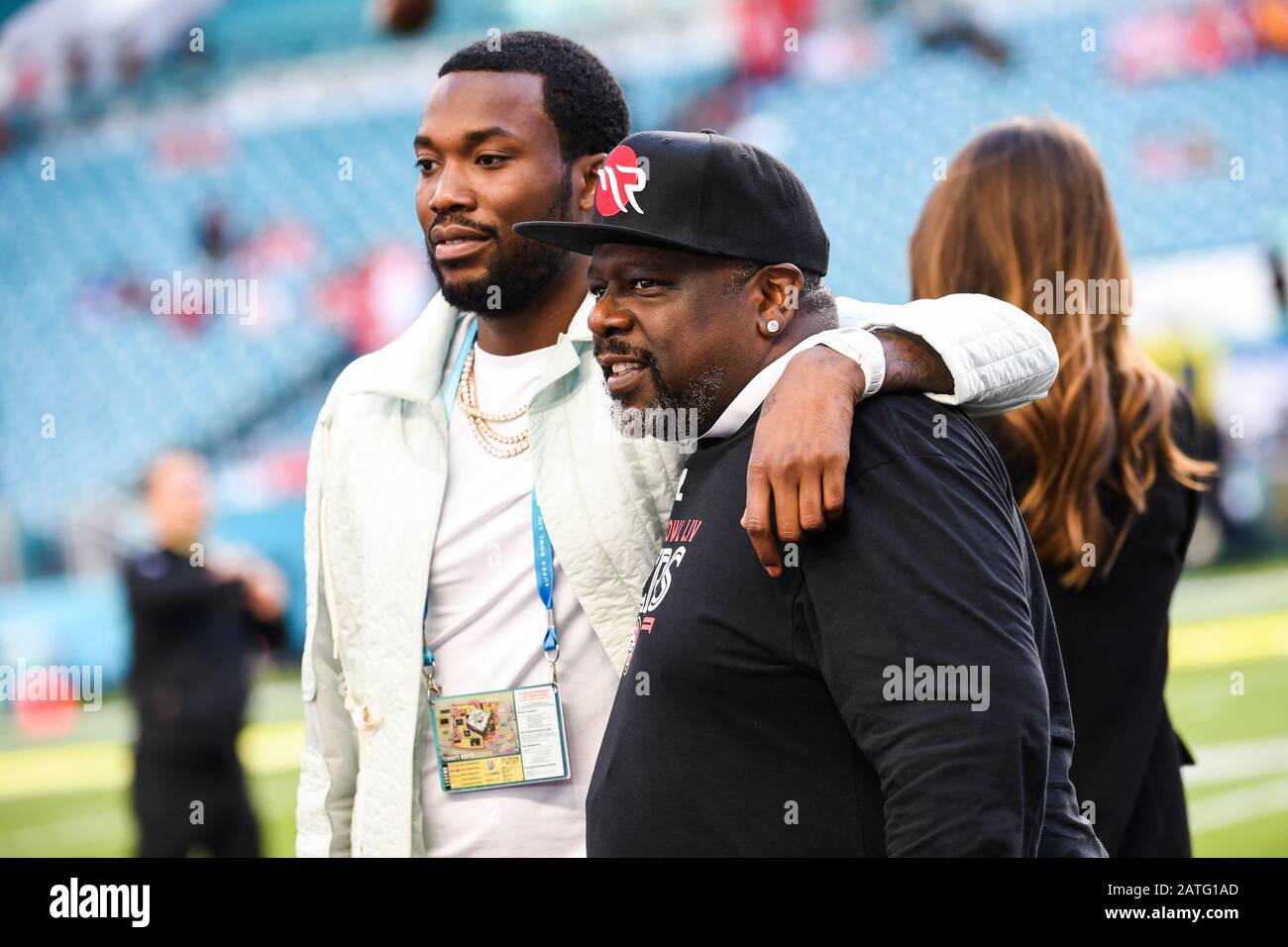 Miami Gardens, USA. 02nd Feb, 2020. Meek Mill and Cedric the Entertainer pos for photos on the field before Super Bowl LIV between the San Francisco 49ers and the Kansas City Chiefs held at Hard Rock Stadium in Miami Gardens, Florida on Feb. 2, 2020. (Photo by Anthony Behar/Sipa USA) Credit: Sipa USA/Alamy Live News Stock Photo