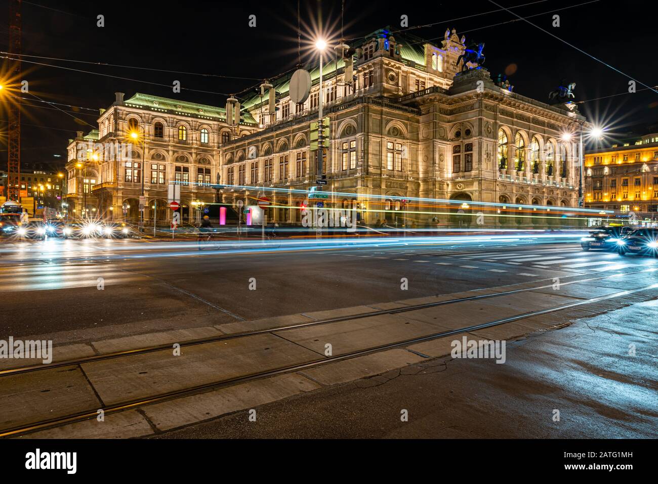 People watching open air live Opera outside the State Opera House in  Karajan Platz Vienna in Austria Stock Photo - Alamy